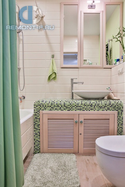Интерьер ванной в бежево-зеленых тонах